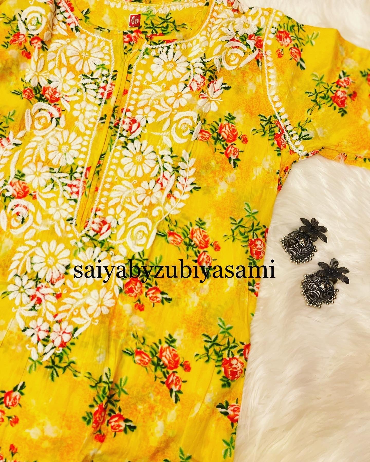 GUL-E-MULMUL YELLOW PRINTED KURTA